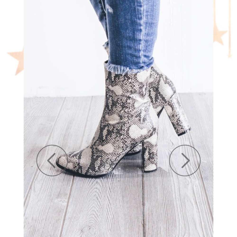 Brand New snake skin pattern boots